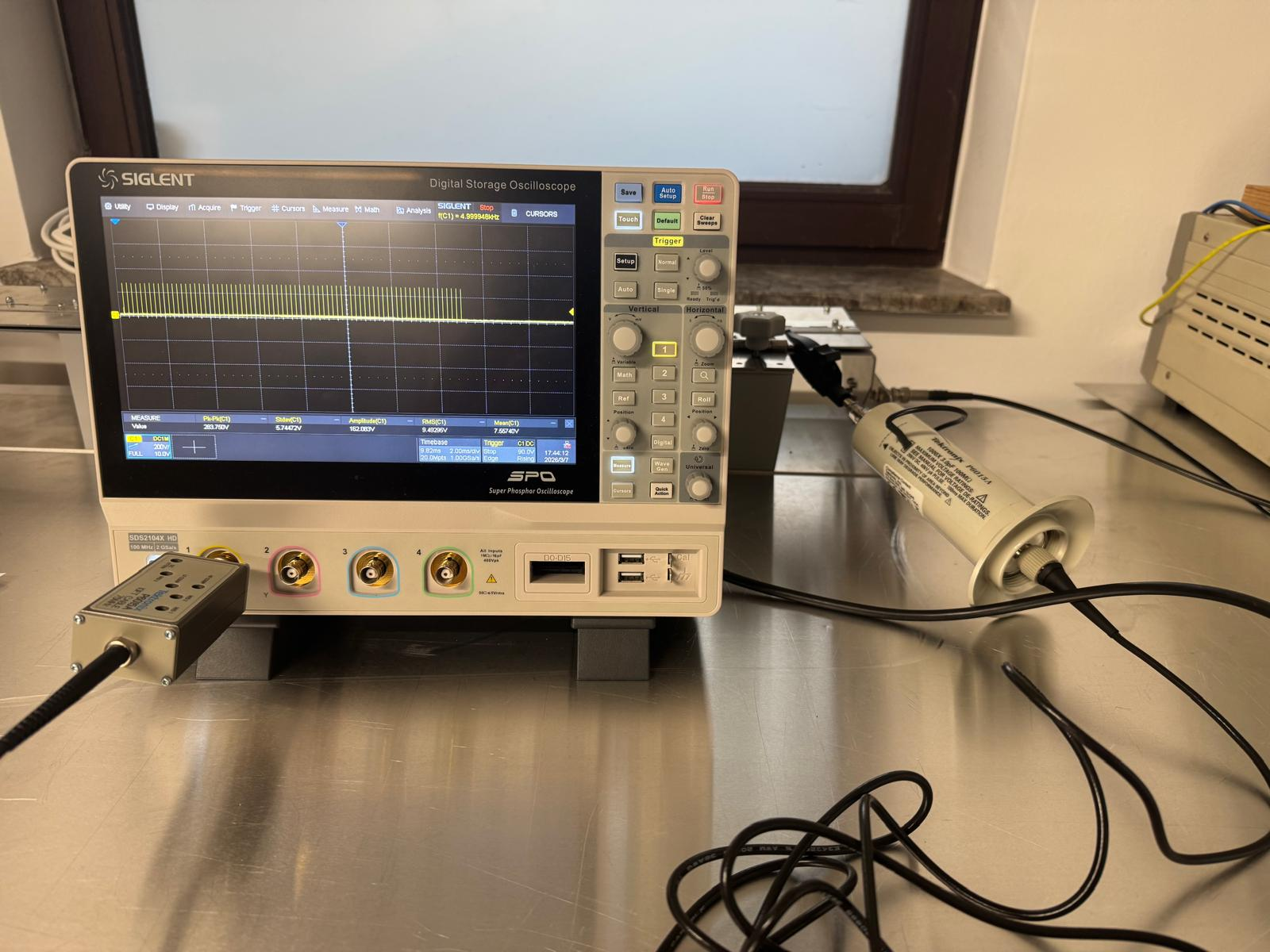 Test setup: Siglent oscilloscope with EFT burst generator